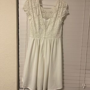 White knee length dress.